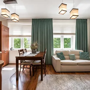 https://ogrodowa-warm-wood-apartment.warsawhotelspoland.com